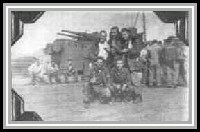 photograph of crew celebrating end of war