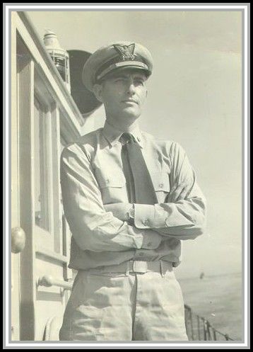 photograph of Lieutenant Commander O. C. Rohnke aboard the SAVAGE in 1944