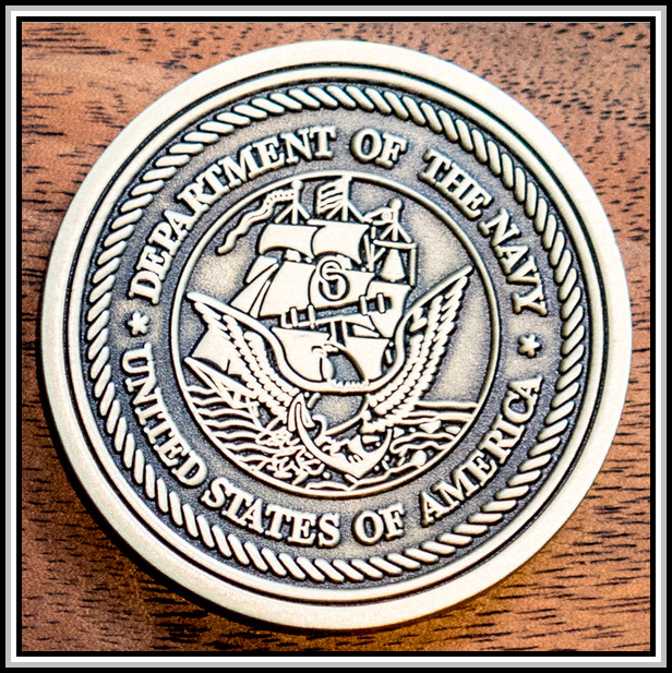 photograph of 2015 challenge coin (back)